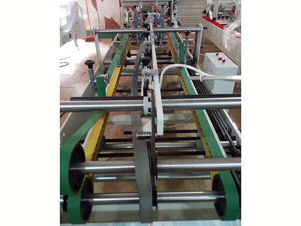 膠(jiao)邊折(she)盒機(ji)器